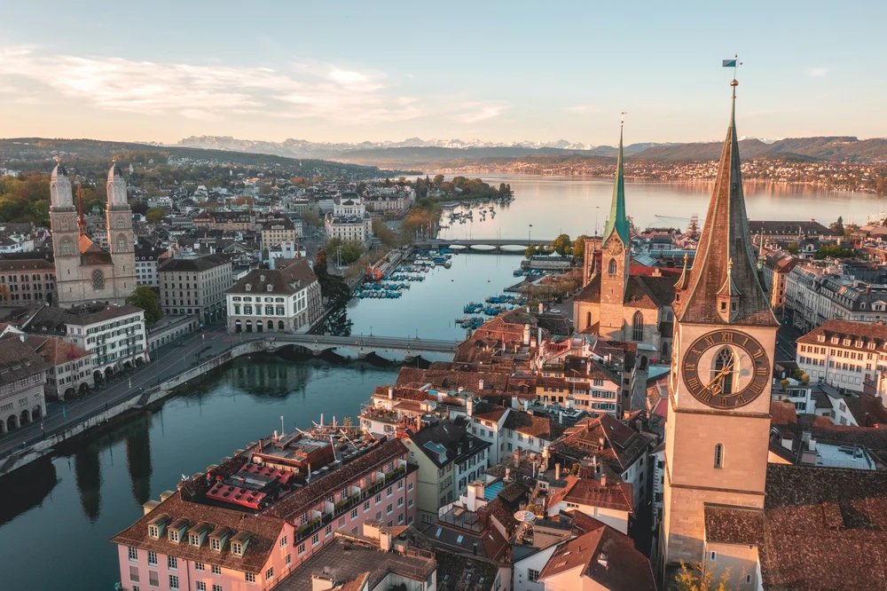 Vibrant cityscape of Zurich along the Limmat River